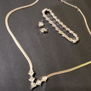 Silver tone necklace, bracelet, earrings set